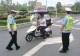 商城交警:编码登记与路面整治同步推进 筑牢电动车整治安全防线